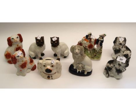 Four pairs of small 19th Century Staffordshire figures of seated spaniels, pair of porcelain figures of pug dogs and a large 