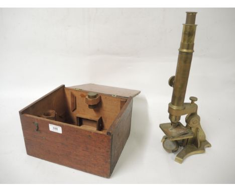 Victorian gilt brass monocular microscope, in a fitted case 