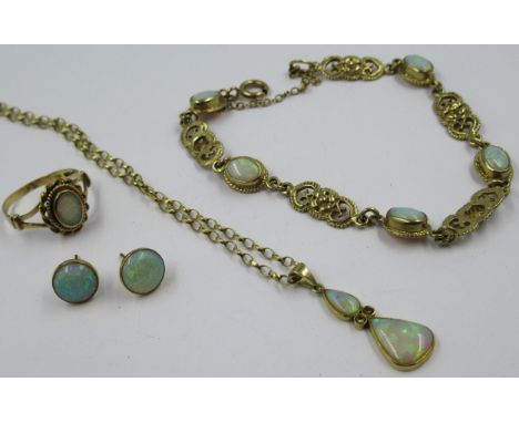 9ct Gold opal set bracelet, together with a similar 9ct gold ring, 9ct gold pendant on chain and a pair of similar unmarked e