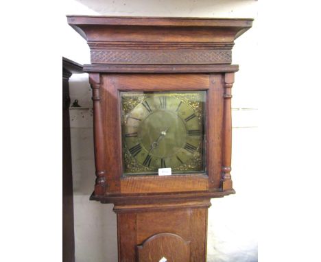 Late 17th / early 18th Century oak longcase clock, the square hood with flanking pilasters above a moulded arch panel door an