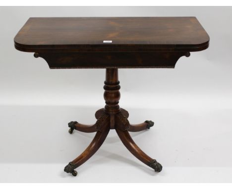 19th century rosewood crossbanded fold-over card table, with turned column and splayed supports, with brass hair and paw feet
