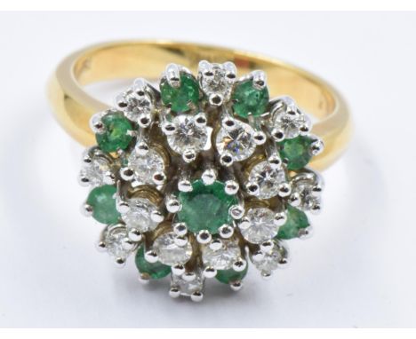 18ct Yellow gold ring set emeralds and diamonds in the form of a flowerhead, size N, 8.2g 