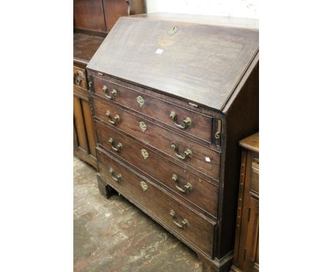George III mahogany bureau, the fall front enclosing a fitted interior above four long graduated drawers with brass swan neck