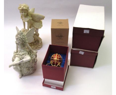 Two resin figures of fairies, a boxed figure holding flowers, together with three Kirov Arts Group boxed gilt metal and ename