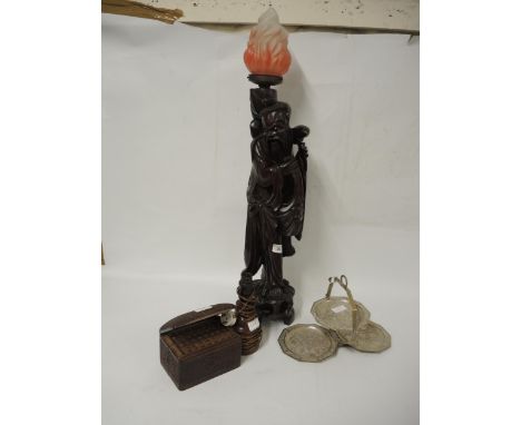 Large carved hardwood lamp base in the form of a sage with later glass shade, 84cm high, together with a carved cigarette box
