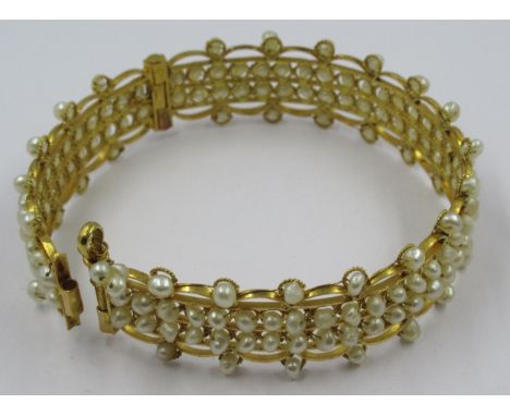 Middle Eastern yellow metal and pearl bangle, 21.5g 