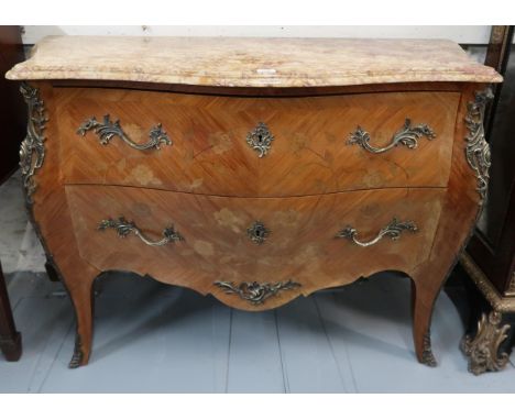 French kingwood marquetry and ormolu mounted commode, its marble top above two drawers on cabriole supports, 124cm wide 