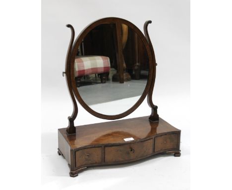 19th Century mahogany serpentine fronted dressing table mirror with three jewel drawers on ogee bracket feet, 49cm x 58cm hig