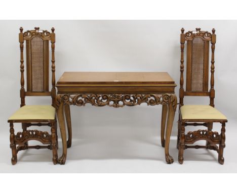 Pair of Carolean style walnut side chairs with cane backs, together with a similar console table in 18th Century style 
