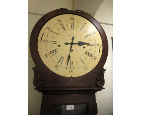 Reproduction American mahogany longcase clock with circular dial inscribed Howard & Miller, having a three train movement and