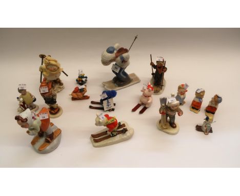 Collection of various porcelain and pottery figures of skiiers etc. including Royal Dux, Goebel and Lladro 