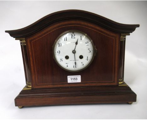 Edwardian mahogany line inlaid mantel clock, the circular enamel dial having Arabic numerals with two train movement striking