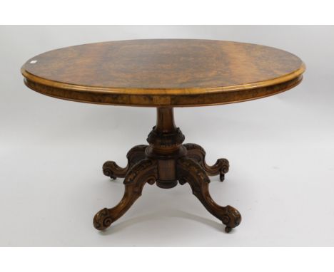 19th Century oval burr walnut loo table on carved central column with cabriole supports, having brass and ceramic casters, 12