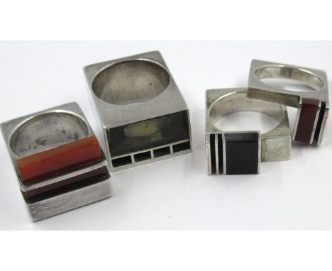 Joel Degen, silver black onyx and cornelian interlocking ring, together with two other similar ringsAll three are marked JD, 