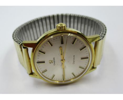 Omega gentleman's circular gold plated manual wind wristwatch with an expanding gold plated strapStrap is not genuine. Curren