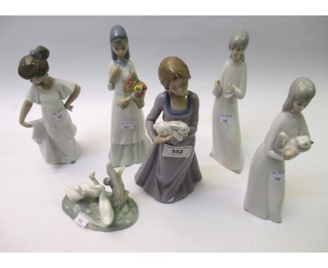 Nao figure of a young lady holding a rabbit, another of a young girl in nightdress, together with a group of three Nao figure