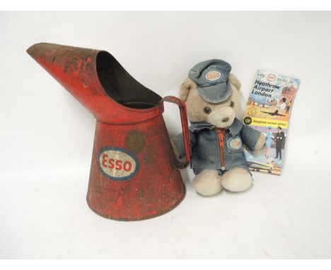 Esso oil can with Esso advertising teddy and Heathrow Airport Esso guide 
