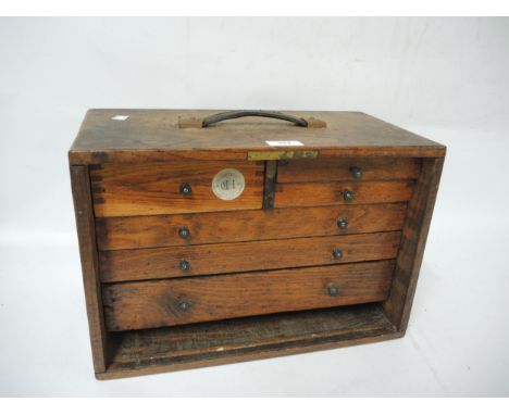Early 20th Century oak engineer's tool cabinet, containing a large quantity of tools 