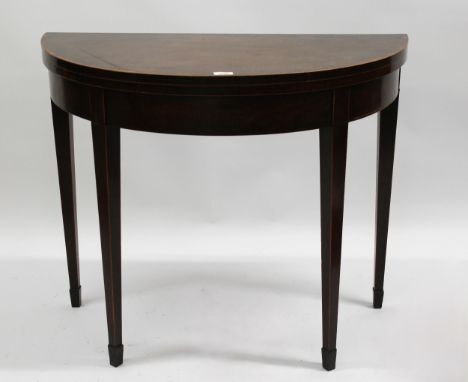 George III mahogany line inlaid demi lune fold-over card table on square tapering supports, 74cm high x 89cm wide x 44cm deep