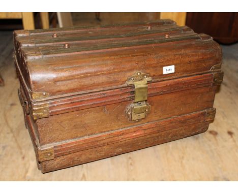 Late 19th / early 20th Century faux wood dome top tin trunk with brass lock 