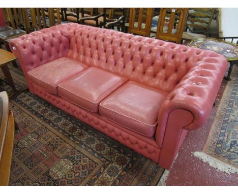 Pink chesterfield sofa