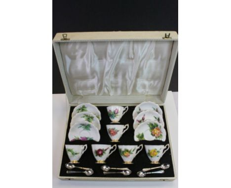 Cased Set of Six China Cups and Saucers with Spoons, each illustrating a different Rose grown by Henry Wheatcroft