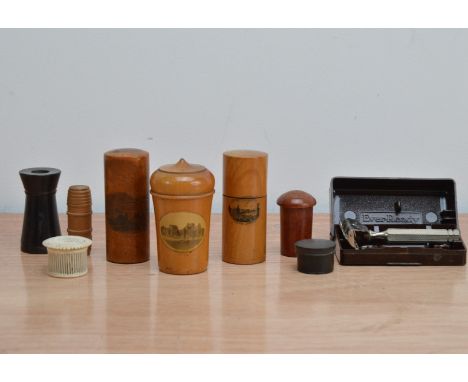 A collection of works of art, comprising, small treen storage pot, a bone prisoner of war pierced container with small domino