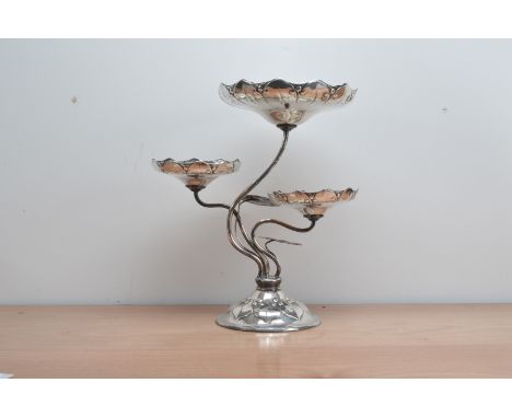 An Art Nouveau white metal centre-piece, floral design, 44cm high, with a rubbed mark to the base 