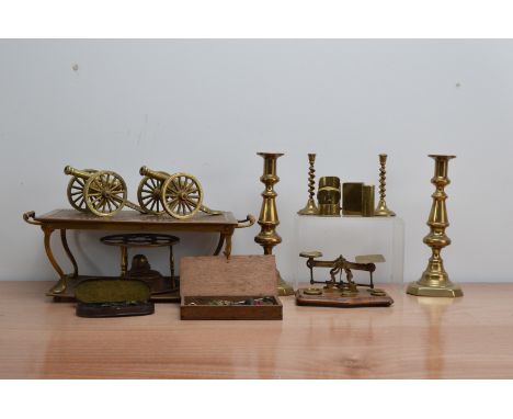 A collection of metalware's, comprising a copper and  brass handled heated tray 15cm x 42.5cm, two pairs of brass candlestick