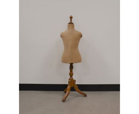 A 20th century child's mannequin, numbered 22, 48cm high, AF