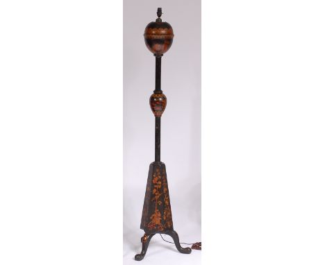 An early 20th century ebonised and chinoisserie decorated lamp stand, having a double knopped column to a flaring hexagonal b
