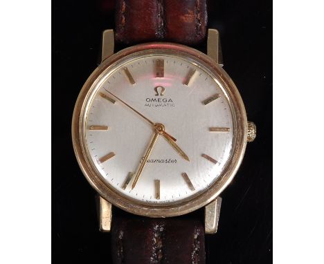 An Omega gents 9ct gold cased Seamaster wristwatch, having a signed silvered dial, baton markers, automatic movement, circa 1