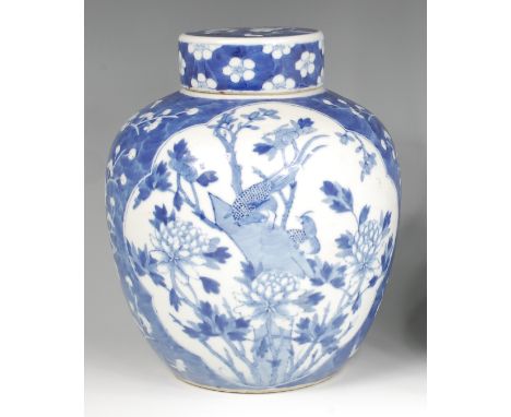 A 19th century Chinese export blue and white jar and cover, of baluster form, decorated with exotic birds amidst flowers and 