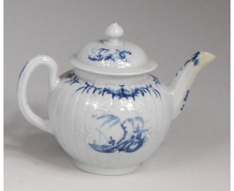 A first period Worcester bachelors teapot and cover, of bullet shape, having fluted body, underglaze blue painted with opposi