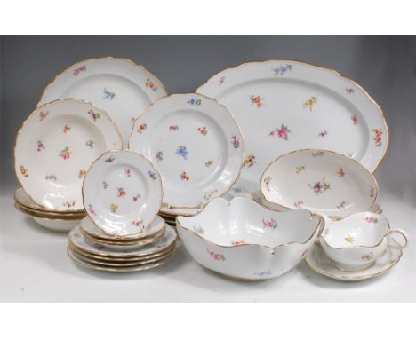 An extensive late 19th century Meissen porcelain part dinner service, comprising; 20 dinner plates, 10 side plates, 10 tea pl