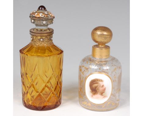 A late 19th century Bohemian glass scent bottle, with enamel and gilt metal jewelled stopper, 13cm; together with a late 19th