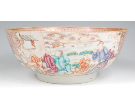 A 19th century Chinese famille rose footed bowl, enamel decorated with reserves of figure scenes within honeycomb borders hei