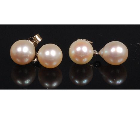 A pair of 18ct white gold and pearl ear studs, each with single pearl pendant drop, dia.9mm