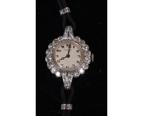 An Art Deco ladies Vertex cocktail watch, having signed silvered dial with Arabic numerals, manual wind movement, the white m