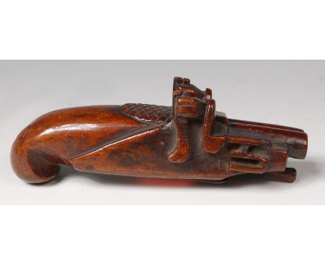 A 19th century treen snuff-box, carved as a double barreled flintlock pistol, hinged to underside, 13.5cm Condition Report / 
