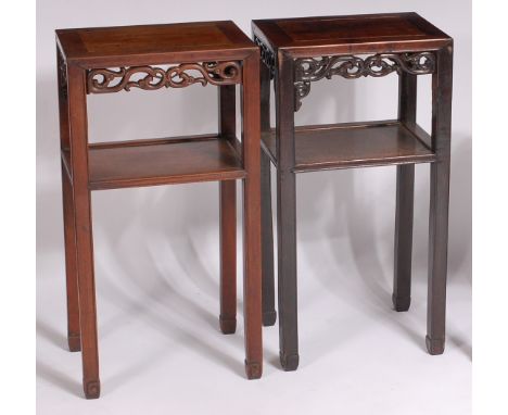 A near-pair of circa 1900 Chinese hardwood two-tier occasional tables, each with scroll carved and pierced frieze, w.42cm, d.
