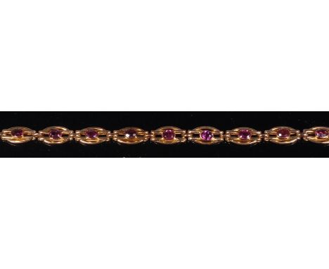 A 9ct gold amethyst set bracelet, with safety chain, the eleven oval links all set with single oval cut amethyst, 9g, length 