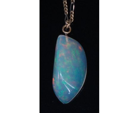 A large polished opal pendant, the three-sided opal measuring approx 30 x 15 x 9mm, on 14ct gold flat curblink neck chain