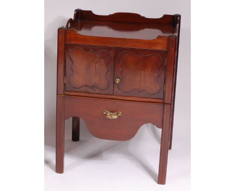 A George III mahogany commode, the tray top above panelled cupboard with later felt-lined pull-out drawer below, w.57cm, d.49