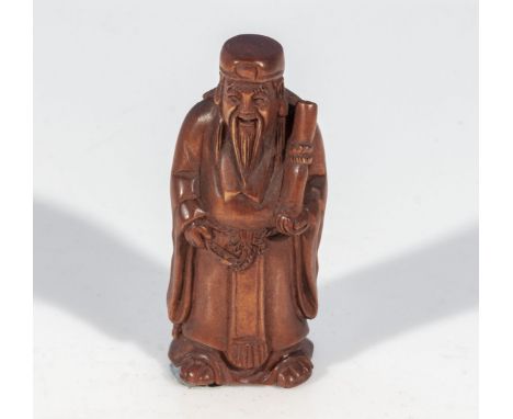 Hand carved hardwood Netsuke of an immortal (signed) 