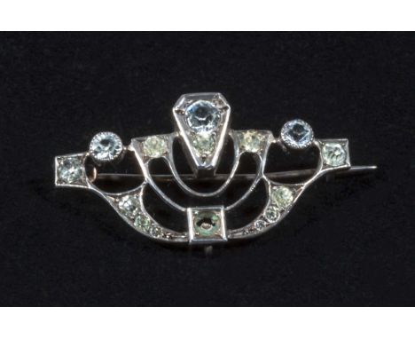 A small silvered metal Art Deco brooch, three stones missing, 3.5cm