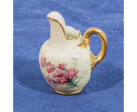 A miniature Worcester jug finely painted with flowers, with puce mark to base, 1.5" tall