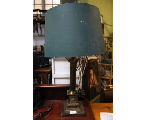 A brass finished Classical column table light with shade