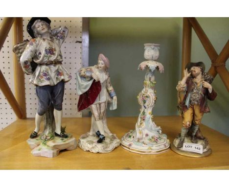 'Meissen' candlestick and three porcelain figures.