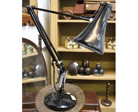 A Herbert Terry Anglepoise lamp, black, together with a small stool